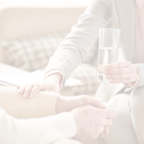 scene offering water as support gesture in private counselling services setting